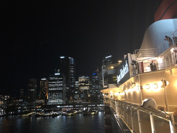 Ship and city at night